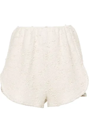 Ioana Ciolacu Shorts i denim med slitageeffekt