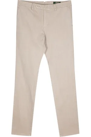 MAN ON THE BOON. Chinos med knaplukning