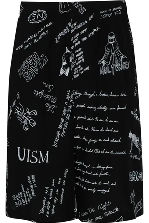 UNDERCOVER Shorts med brede ben og grafisk tryk