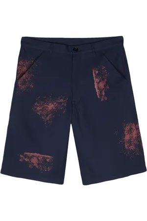 Comme des Garçons Shorts med malingssprøjt