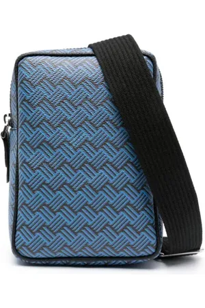 DELAGE Sling crossbody-taske i kanvas