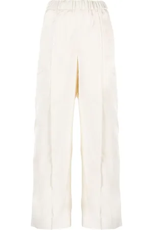 Jil Sander Jeans med elastisk talje og brede ben