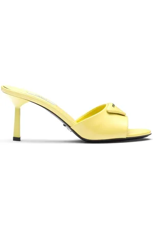 Prada Metallisk mules i læder med trekantet logo
