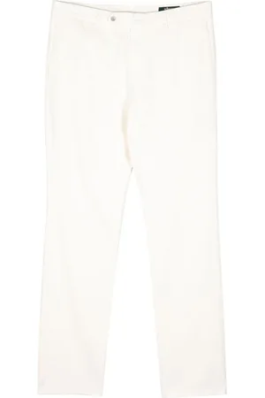 MAN ON THE BOON. Chinos med knaplukning