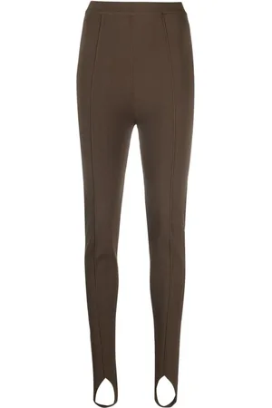 Nanushka Højtaljede leggings med rem under foden