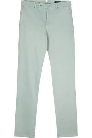 MAN ON THE BOON. Chinos med knaplukning