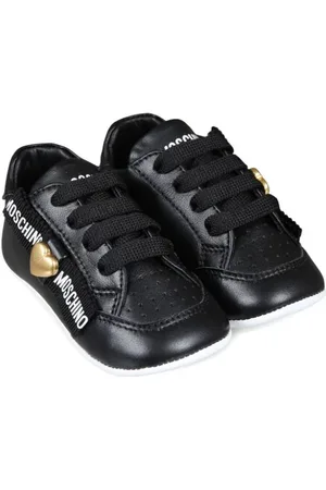 Moschino Slip-on-sneakers med logobånd
