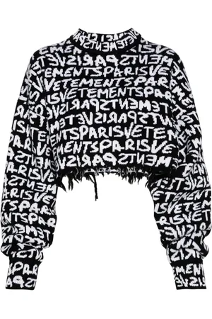 Vetements Intarsiastrikket sweater med logo