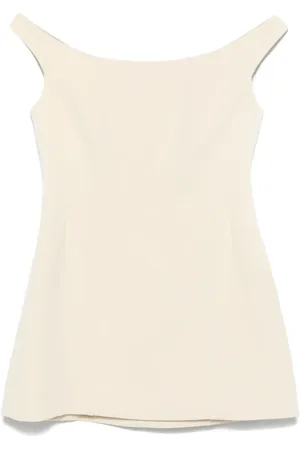 Totême Top med kurvet off-shoulder-snit