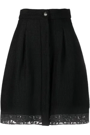 CHANEL Bouclé-nederdel med blondekant fra 00