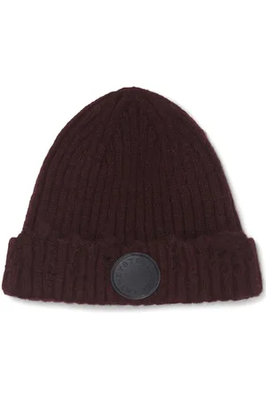Stella McCartney Ribstrikket hue med slitageeffekt