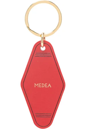 Medea Nøglering med præget slogan