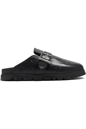 MCM Flade mules i læder med monogram