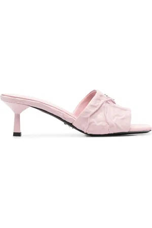 Prada Quiltede mules med trekantet logo