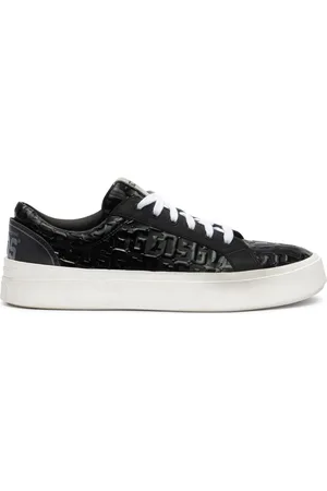 GCDS Sneakers med lakeret monogram