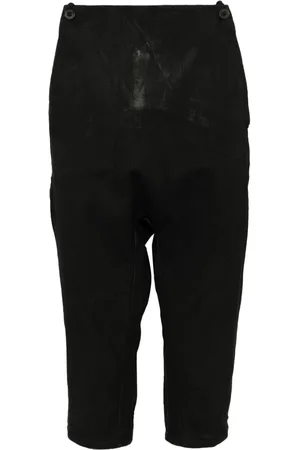 11 BY BORIS BIDJAN SABERI Behandlede bukser med pressefolder