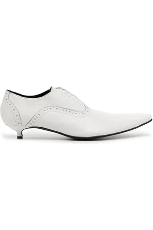 Comme des Garçons Pumps i læder med spids tå