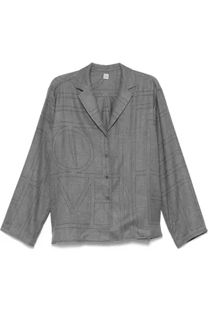 Totême Polo i flannel med monogram