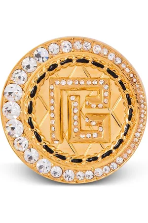 Balmain Broche med rhinstenudsmykning