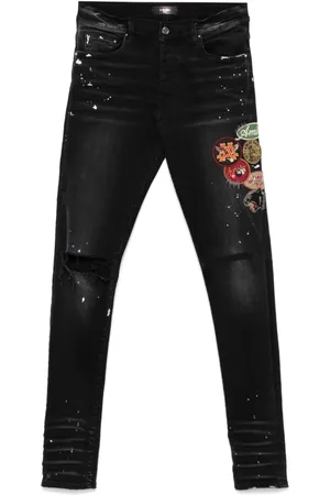 AMIRI Smalle jeans med mærkedetalje