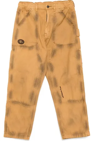 A Bathing Ape Forvaskede jeans med moonface-logo