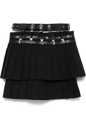 NOIR KEI NINOMIYA X Comme Des Garcons kort nederdel med plisseringer