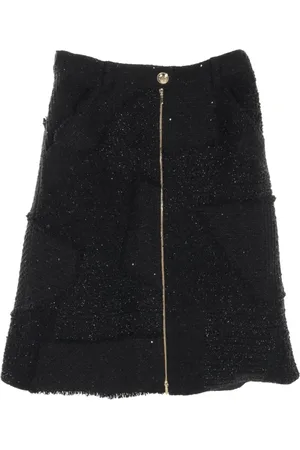 CHANEL Kort nederdel i tweed fra 1986-1988
