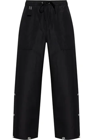 Comme des Garçons Bukser med dekorative knapper