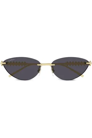 Cartier Solglasögon med geometriska bågar
