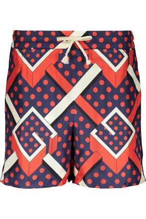 Gucci G shorts med prikker og labyrint-tryk