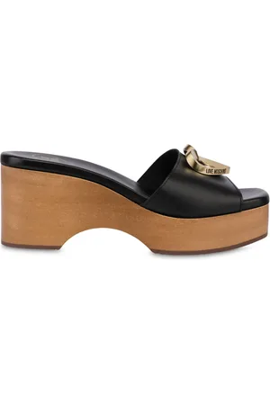 Moschino Mules med logoplade