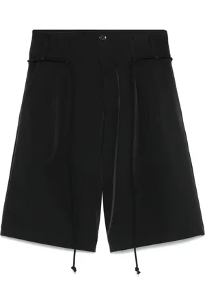 SONG FOR THE MUTE Shorts med dobbelt plissering