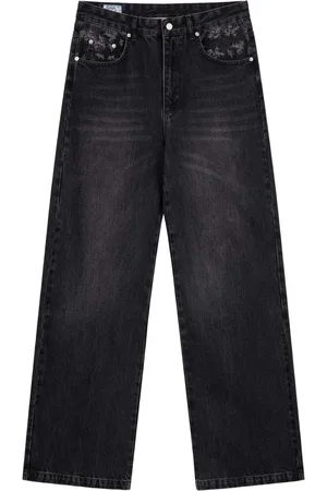 ROUGH. Jeans med brede ben og falmet effekt