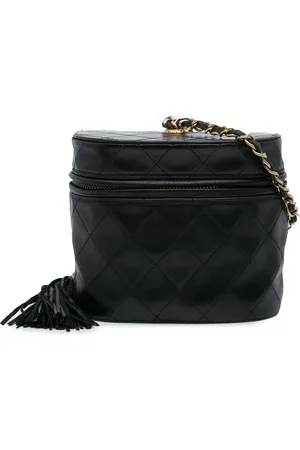 CHANEL Quiltet toilettaske i lammeskind med kvast fra 1989-1991