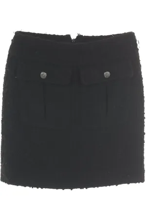 CHANEL Minikjol i tweed från 1986-1988