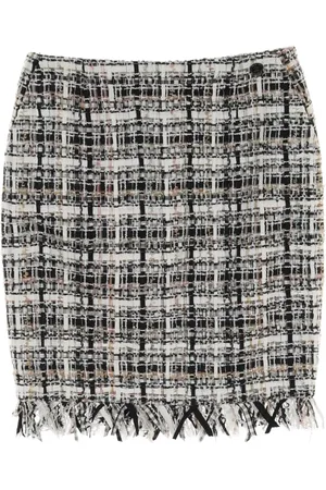 CHANEL Minikjol i tweed från 1986-1988