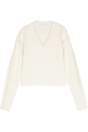 GENNY Sweater i uld med rørformede syninger
