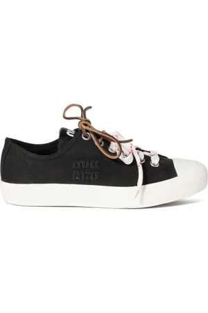 Miu Miu Sneakers i forvasket denim