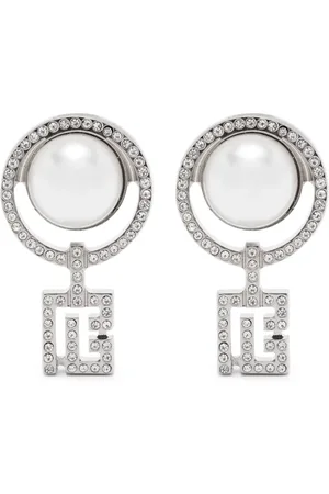 Balmain Art Deco øreclips med poleret finish, clip on-design, runde hvide krystaller og imiteret perle-udsmykning Disse øreringe sælges s...