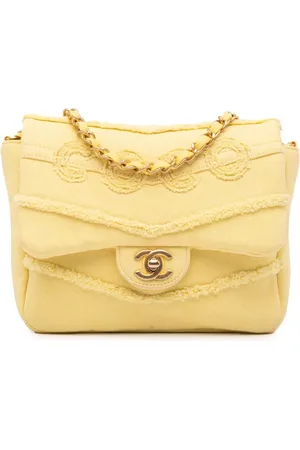 CHANEL Lille chevron Coco Flap crossbody-taske i denim med frynse fra 2019