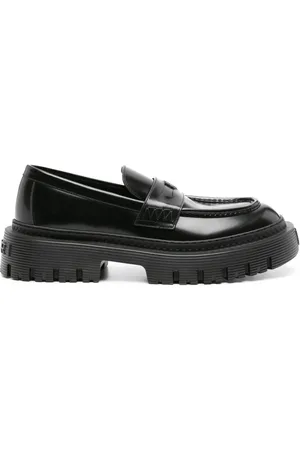 AMIRI Loafers i læder med logoplade