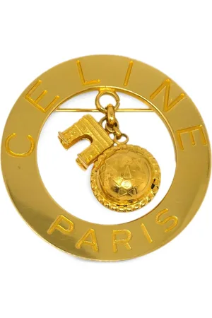 Céline Broche med indgraveret logoplade fra 1990-00
