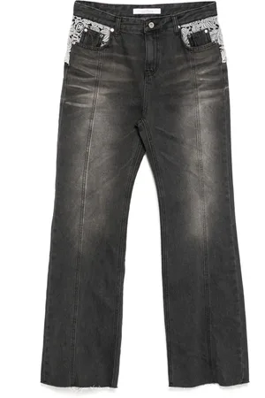 Rokh Jeans med blondedetalje