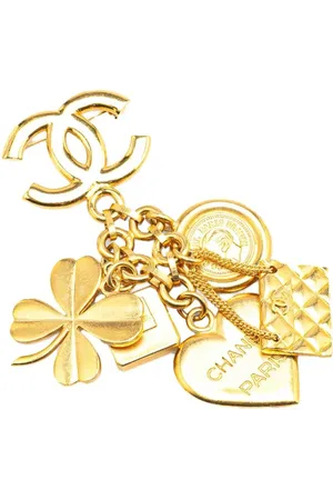 CHANEL Guldbelagt CC Iconic Lucky Charms broche fra 1995