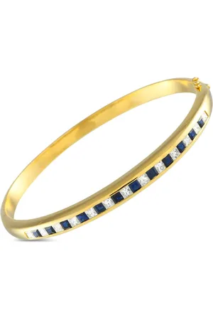 LB Exclusive Armbånd i 18 karat guld med diamant og safir