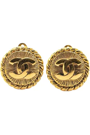 CHANEL Runde guldbelagte CC øreclips fra 1970-1980