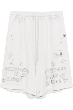 Maison Mihara Yasuhiro Blegede shorts med graffititryk