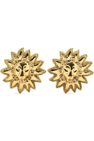 CHANEL Guldbelagte øreclips med løvemotiv fra 1970-1980