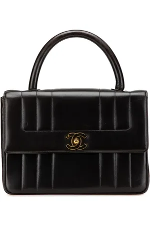 CHANEL Mademoiselle Kelly håndtaske i lammeskind med tophåndtag fra 1994-1996