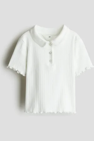 H&M Ribbet top i pointellejersey
